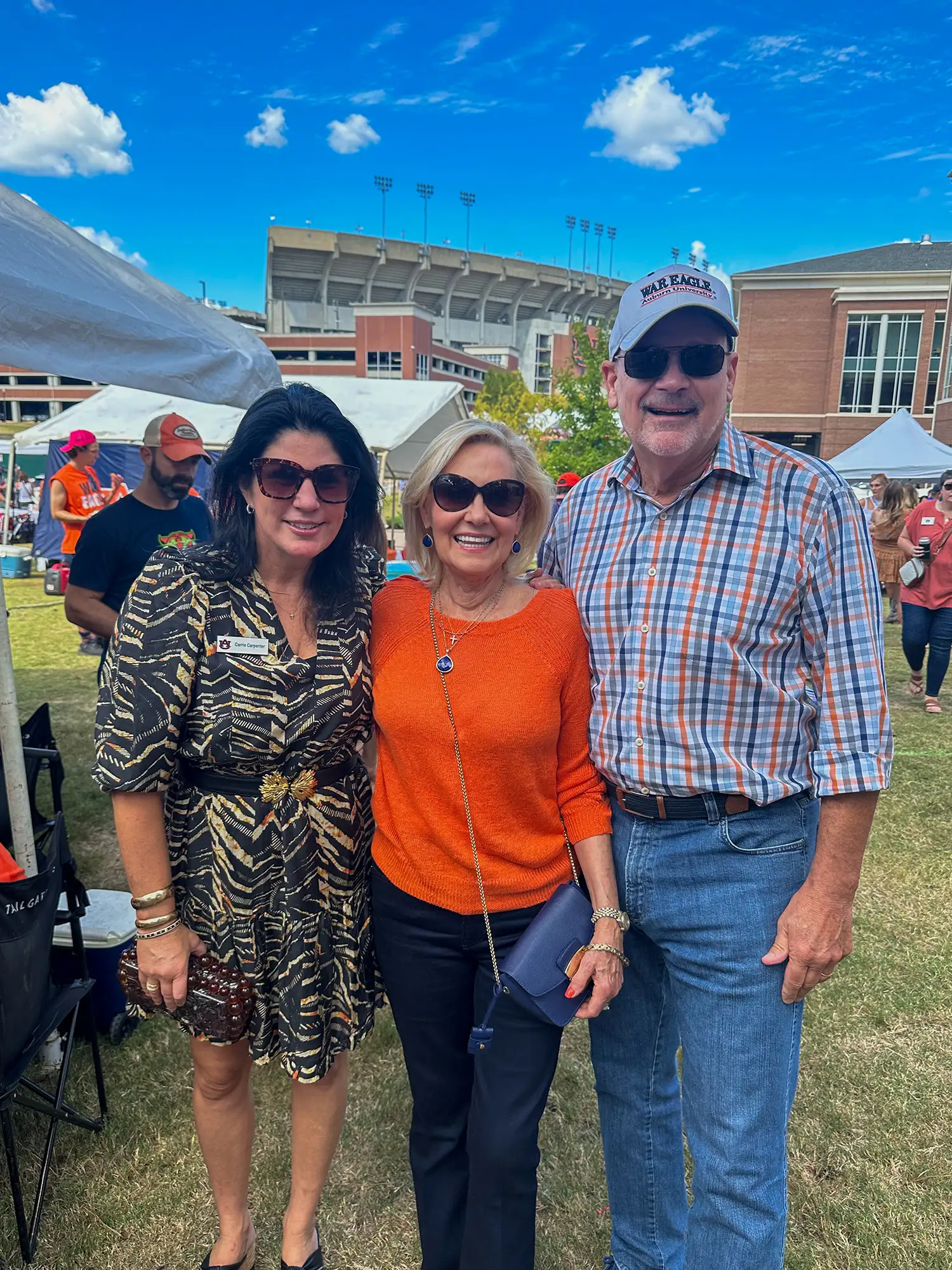 Carrie with alums at tailgate