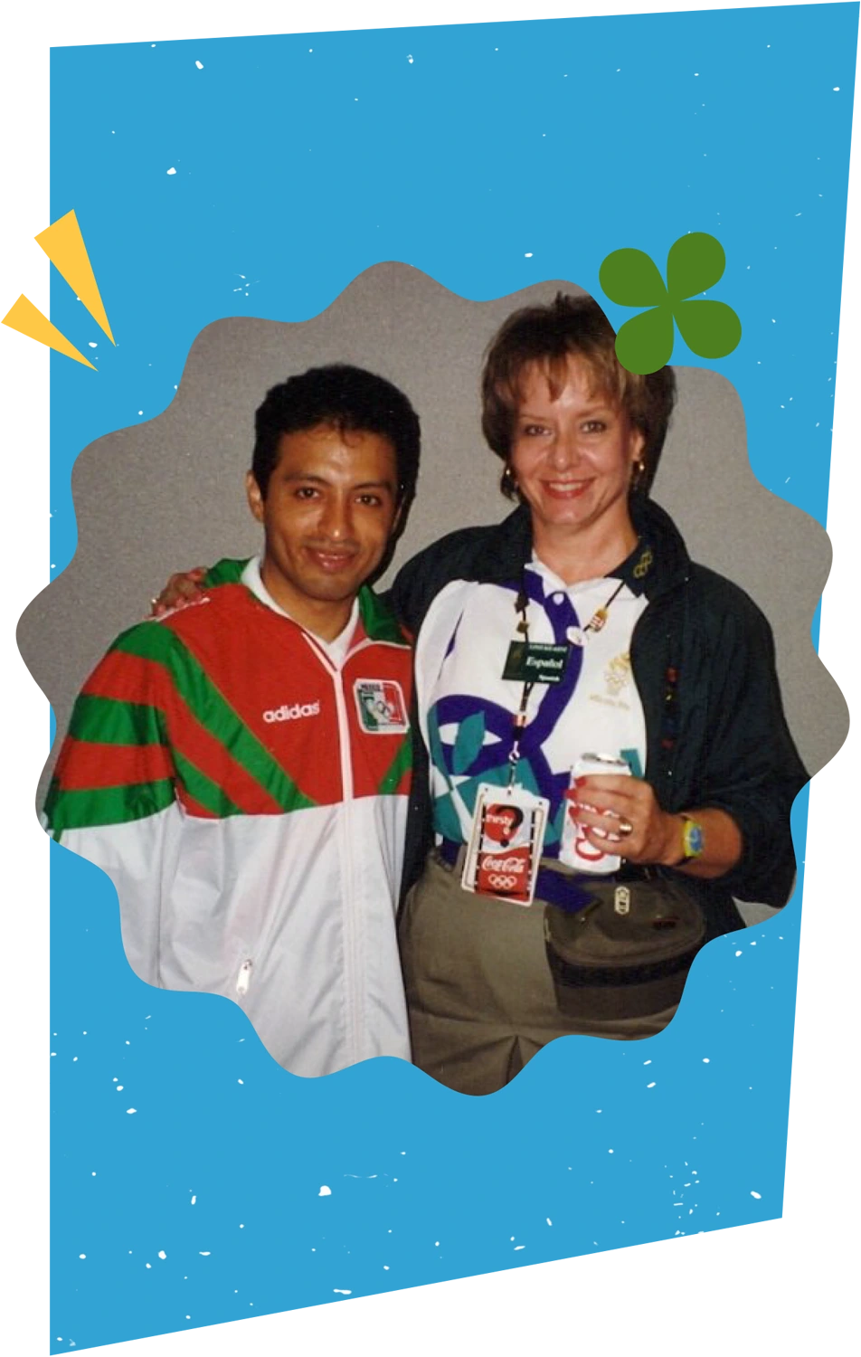 Susan Melton posing for a photo with an athlete on the Mexican table tennis team at the 1996 Olympics.